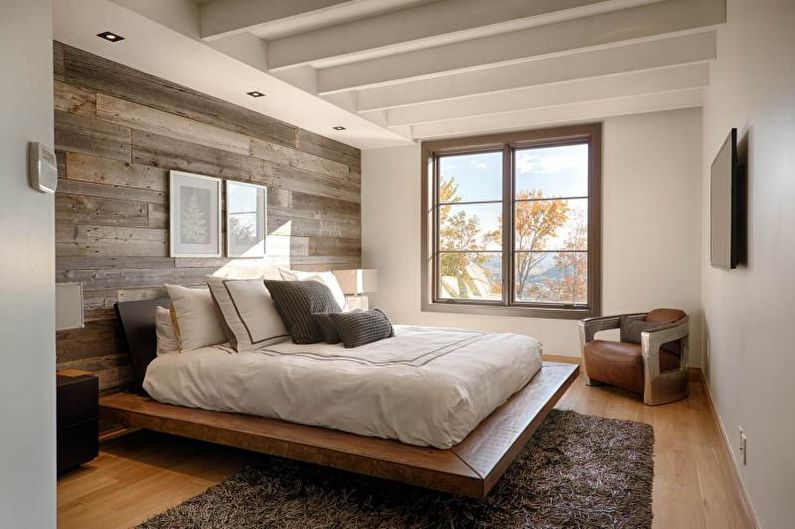Laminate on the wall in the bedroom interior - photo