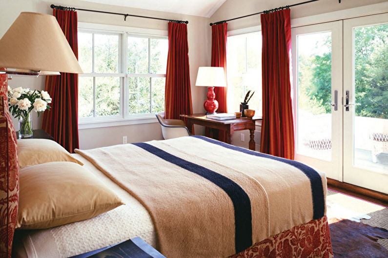 Curtains in the bedroom on the rings with clothespins