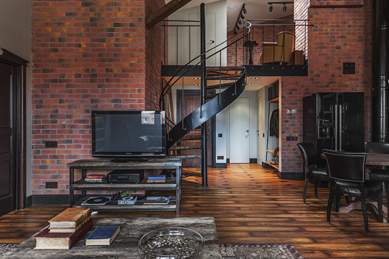 Interiör i en två våningar i loftstil - foto