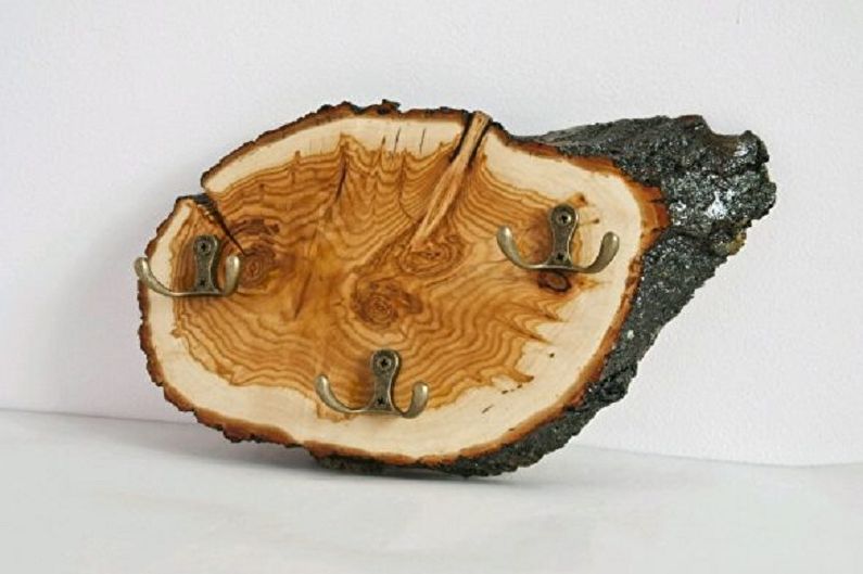 Do-it-yourself wall-mounted key holder for a hall made of wood saw