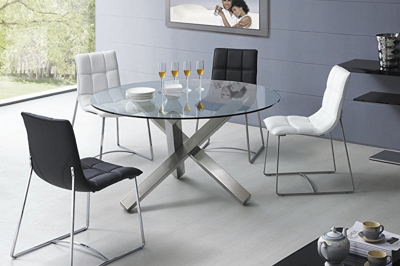 Three-legged dining table