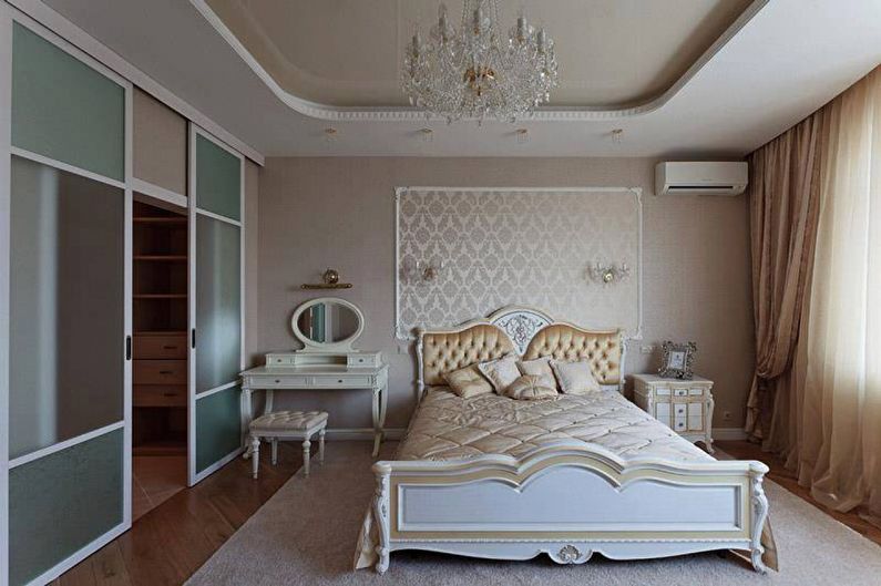 Interior design bedroom in a classic style - photo