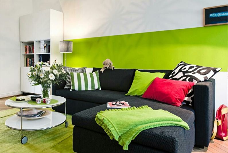Green color in the interior of the living room - photo