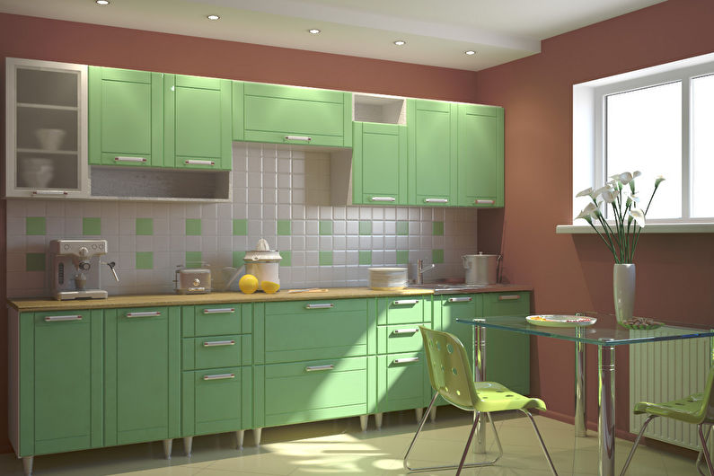 Green color in the interior of the kitchen - photo