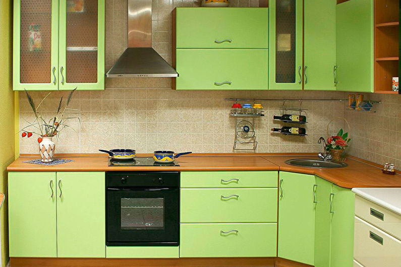 Green color in the interior of the kitchen - photo