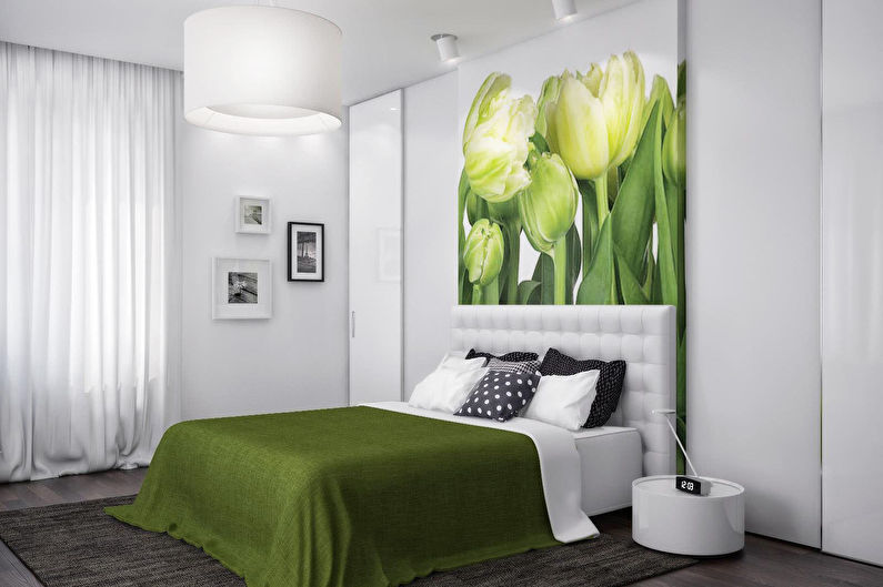 Green color in the bedroom interior - photo