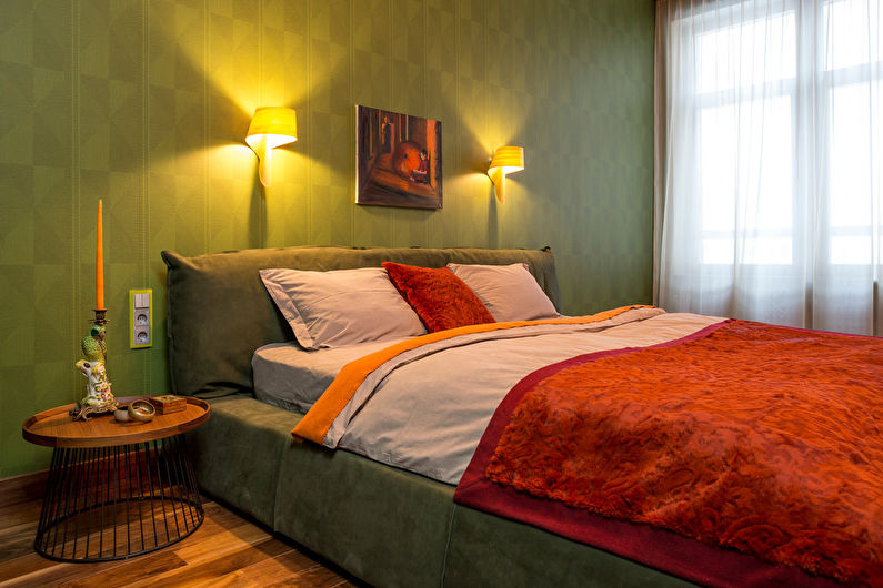 Green color in the bedroom interior - photo