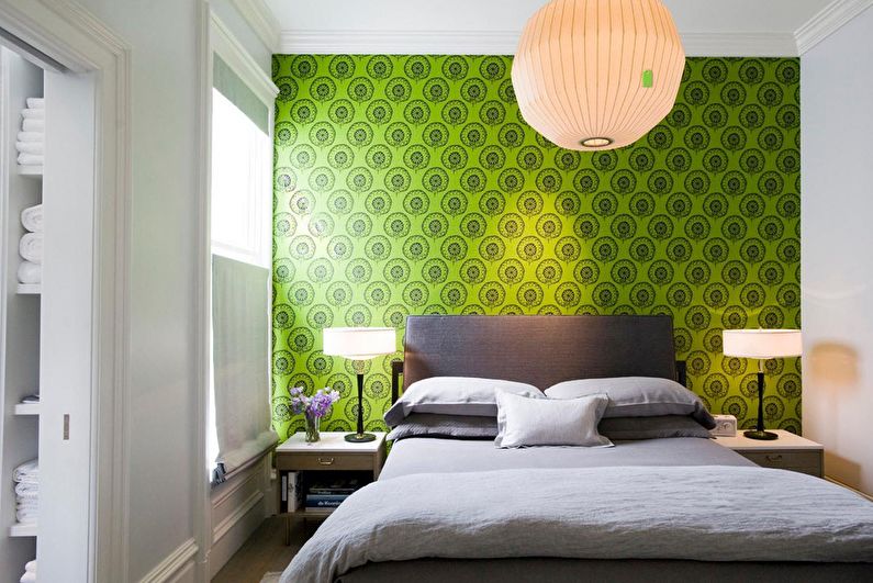 Green color in the bedroom interior - photo