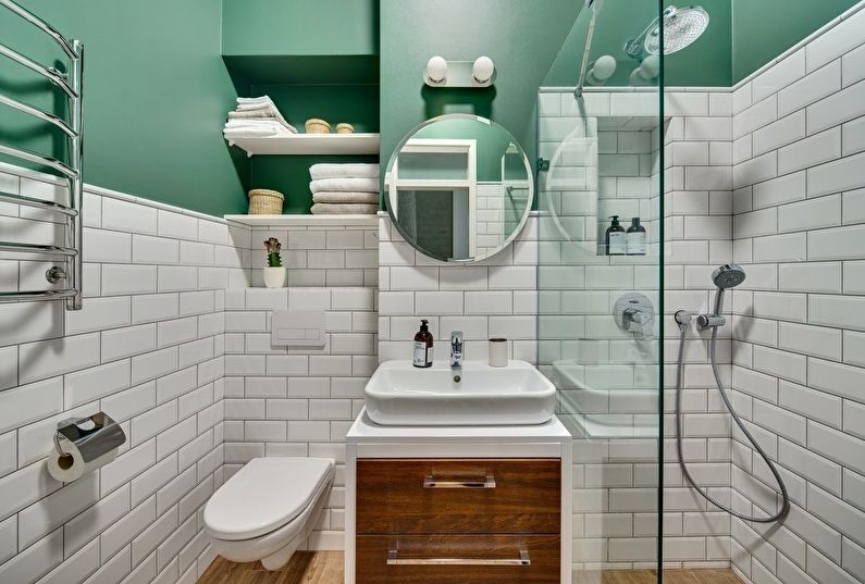 Green color in the interior of the bathroom - photo