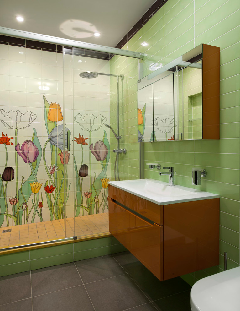 Green color in the interior of the bathroom - photo