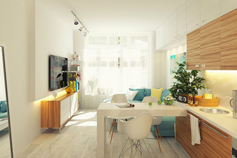 Interior design of a kitchen-living room in the Scandinavian style - photo