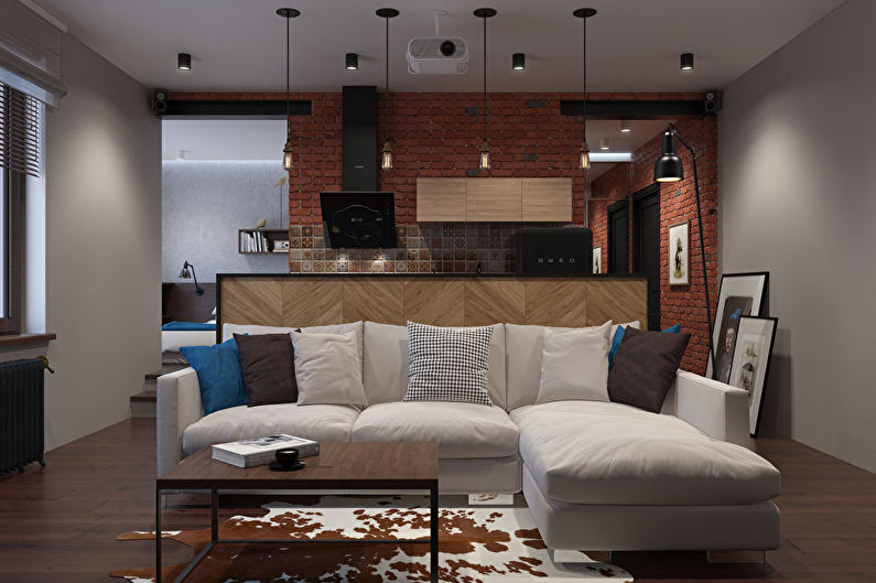 Interior design of a small kitchen-living room in the loft style - photo