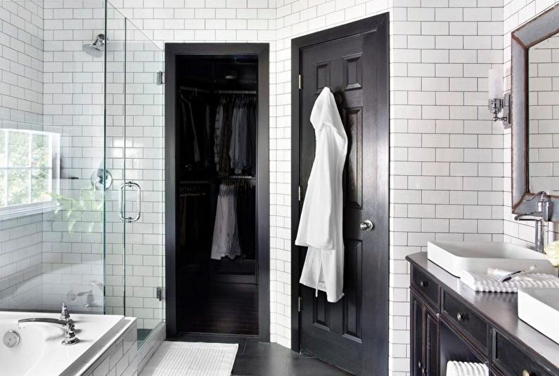 Interior design of a bathroom in black and white - photo