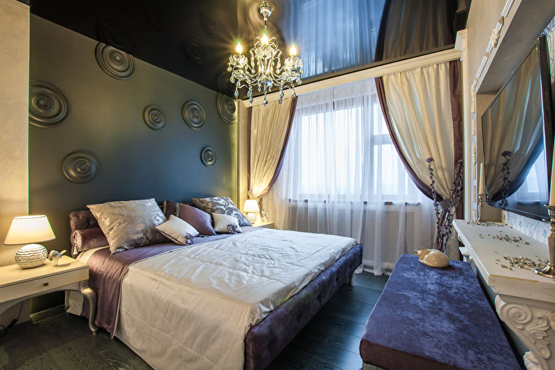 Black stretch ceiling in the bedroom - photo