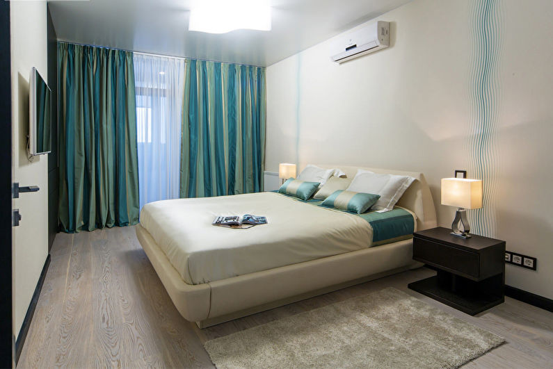 Stretch ceilings in the bedroom - photo