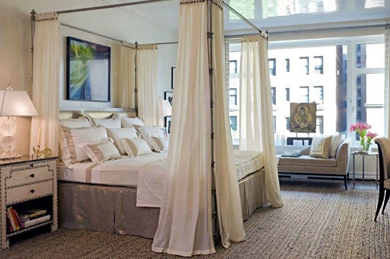 Stretch ceilings in the bedroom - photo