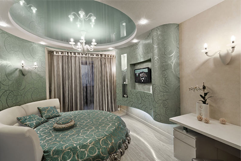 Stretch ceilings in the bedroom - photo