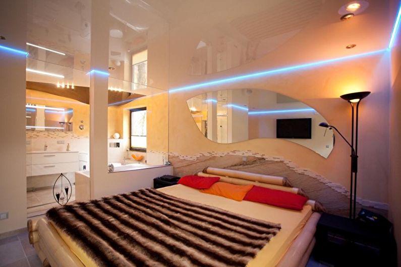 Stretch ceilings in the bedroom - photo