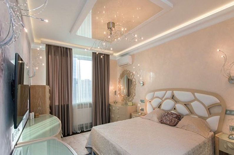 Stretch ceilings in the bedroom - photo