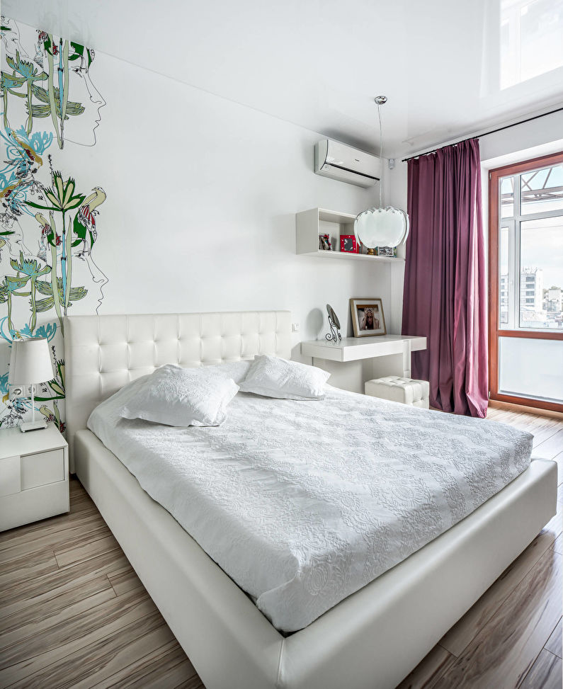 White stretch ceiling in a small bedroom - photo