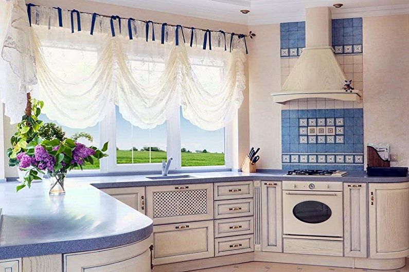 Beige kitchen - interior design photo