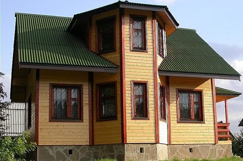 Houses made of timber with a bay window