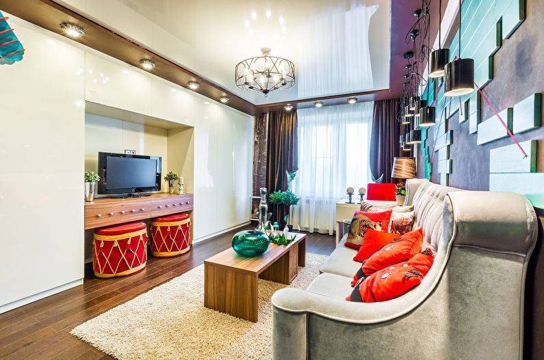 Stretch ceilings in the living room - photo