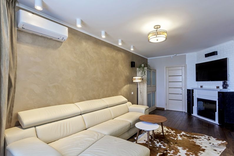 Stretch ceilings in the living room - photo