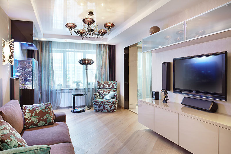 Stretch ceilings in the living room - photo