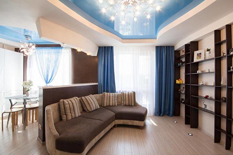 Stretch ceilings in the living room - photo