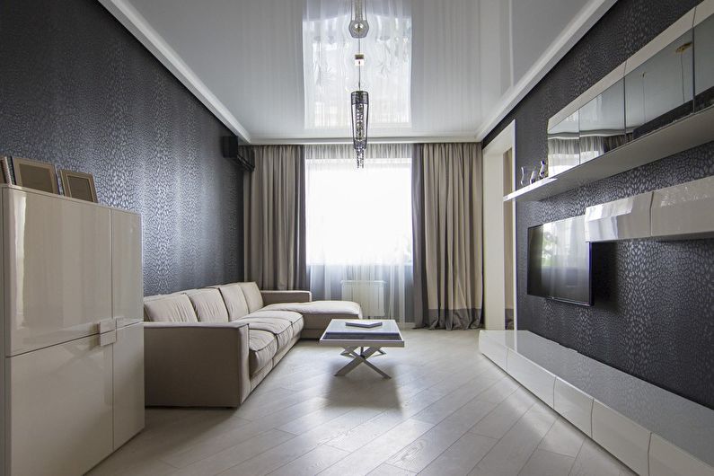 Stretch ceilings in the living room - photo