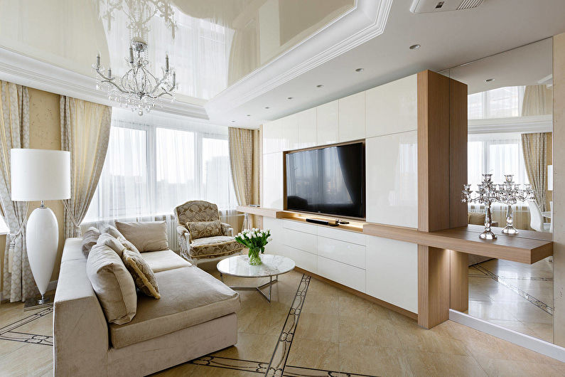 Stretch ceilings in the living room - photo