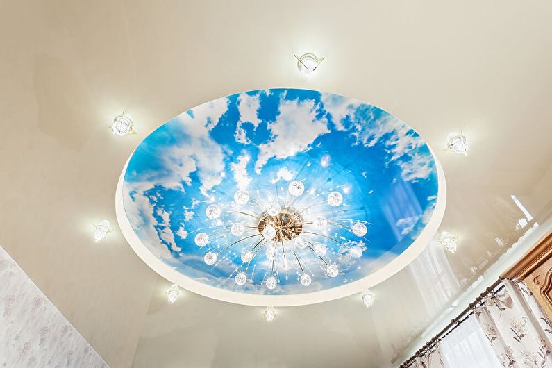 Stretch ceilings in the living room - photo