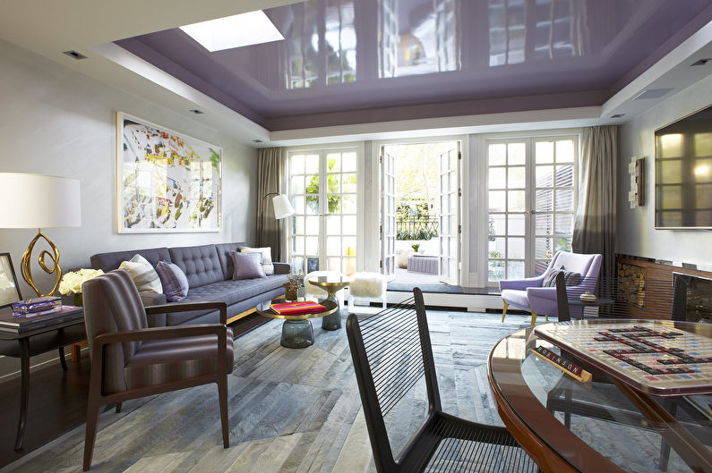 Stretch ceilings in the living room - photo