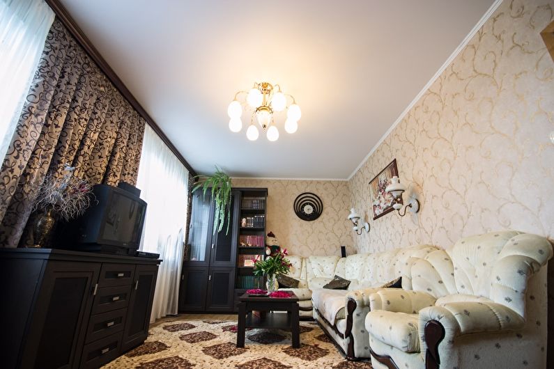 Stretch ceilings in the living room - photo