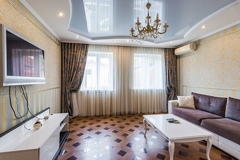 Stretch ceilings in the living room - photo