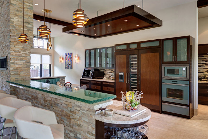 Wall of stone in the interior of the kitchen - photo