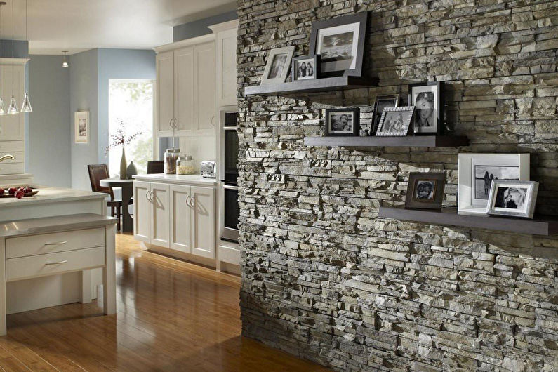 Wall of stone in the interior of the kitchen - photo