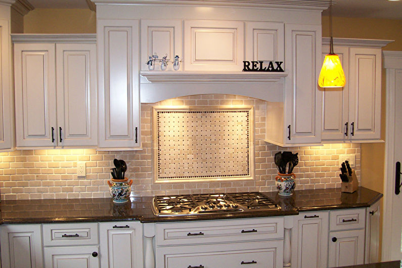 Decorative stone in the interior of the kitchen - photo