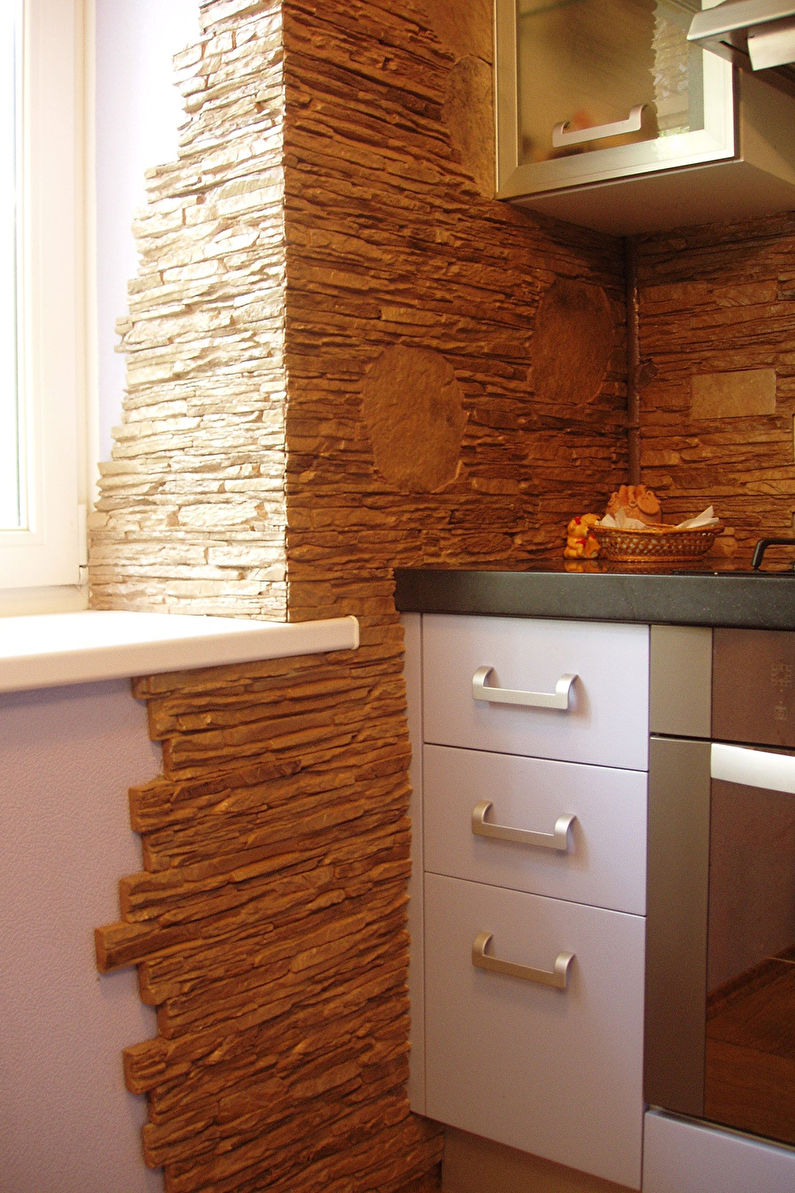 Decorative stone in the interior of the kitchen - photo