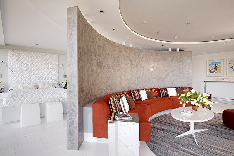Interior design of a living room combined with a bedroom - photo