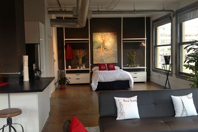 Interior design of a living room combined with a bedroom - photo