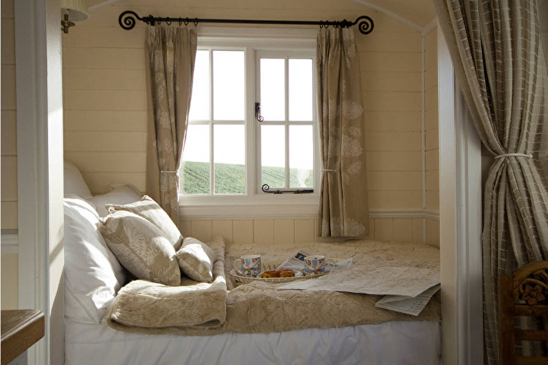 Interior design of a living room combined with a bedroom - photo