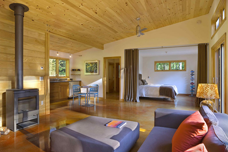 Interior design of a living room combined with a bedroom - photo