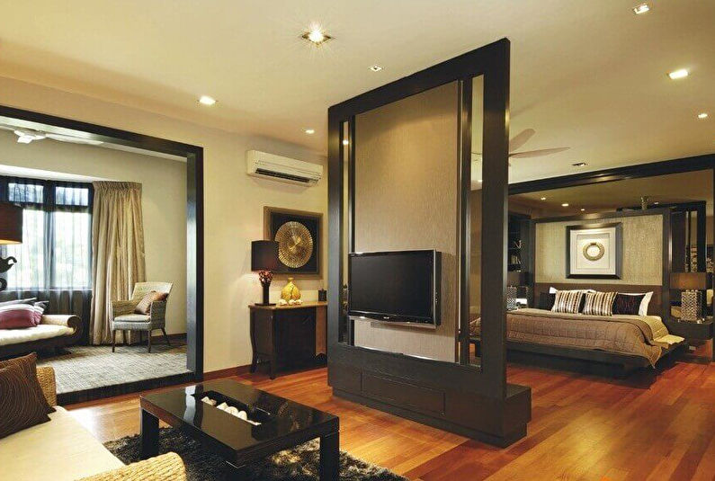 Interior design of a living room combined with a bedroom - photo