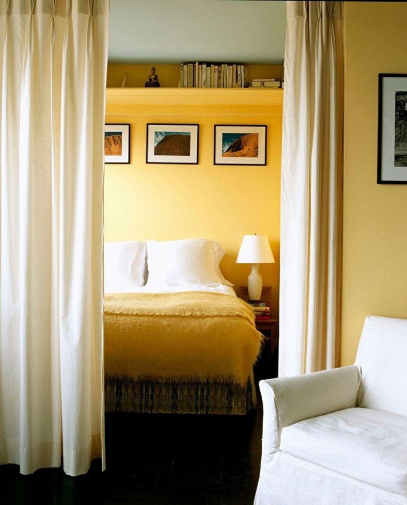 Interior design of a living room combined with a bedroom - photo