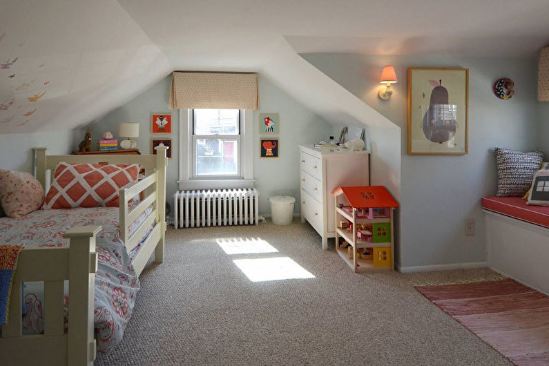 Interior design of a children's room in the attic - photo