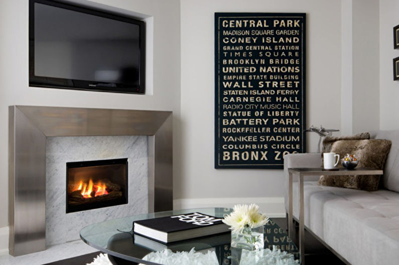 Wall with TV - TV in the living room with fireplace