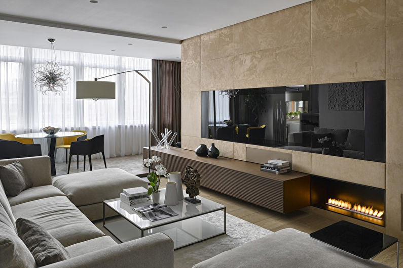 Wall with TV - TV in the living room with fireplace