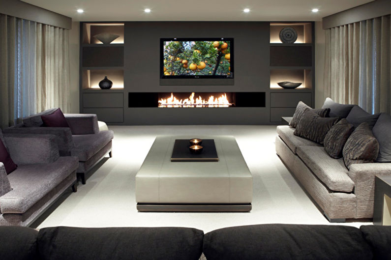 Wall with TV - TV in the living room with fireplace